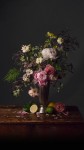 Peonies and roses in a painterly style.